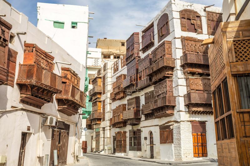 Restored coral-stone houses with wooden balconies in Al Balad, Jeddah’s UNESCO-listed historic district, Saudi Arabia