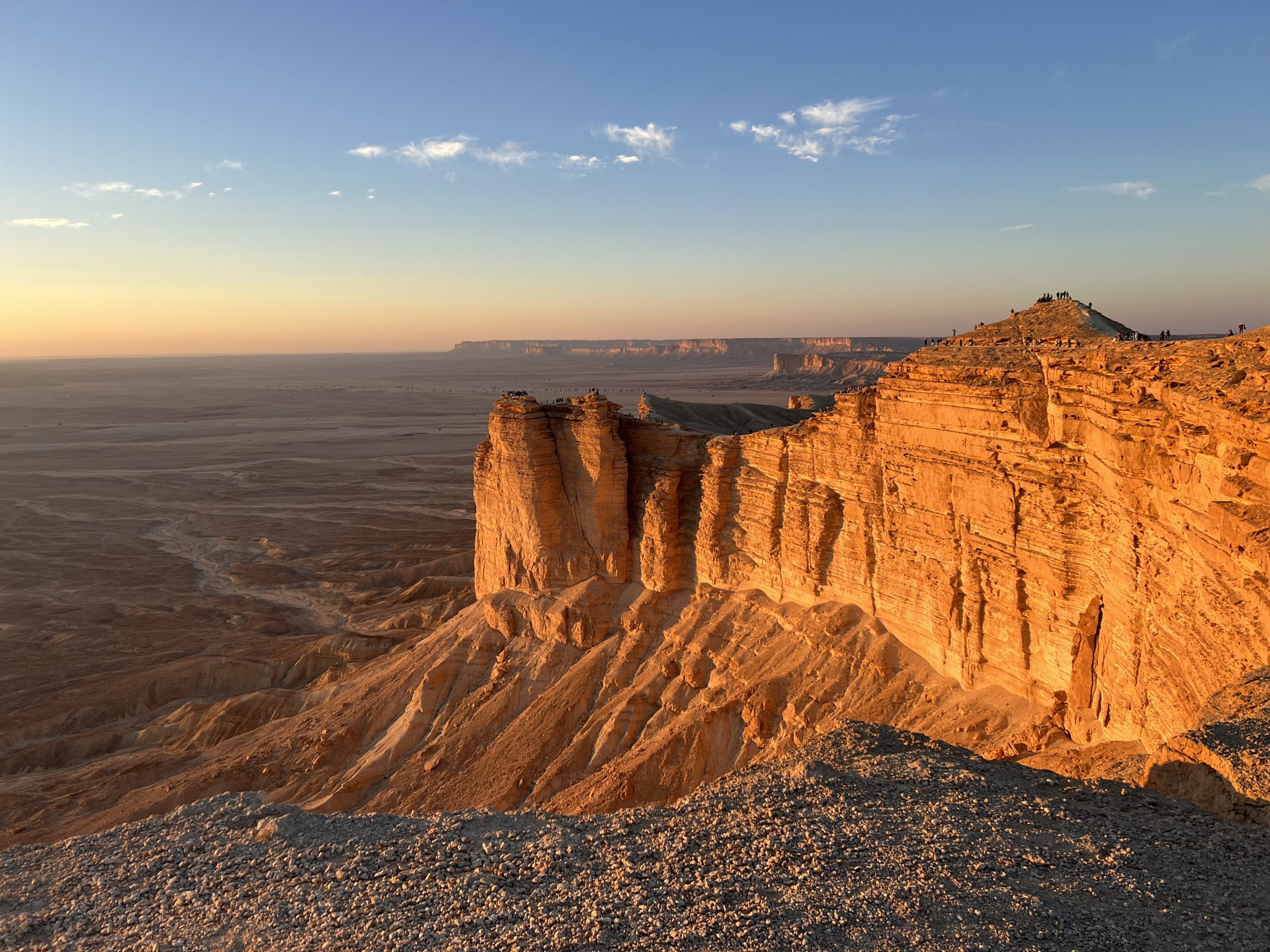Dramatic cliffs at the Edge of the World, Jebel Fihrayn, overlooking the desert plains near Riyadh, Saudi Arabia