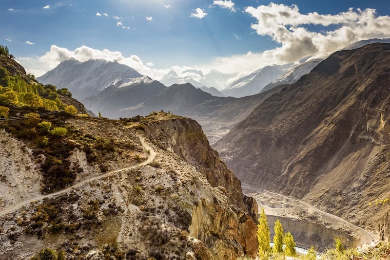 Winding mountain road overlooking dramatic peaks in Pakistan’s Hunza Valley