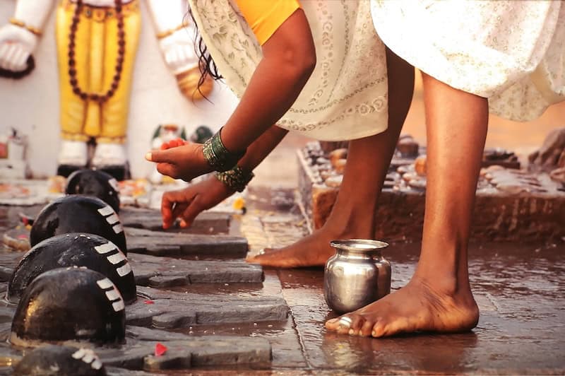 Traditional puja ritual performed along the ghats of Varanasi on the Ganges